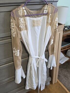 Hildy Robe in White by the brand Robed with Love.